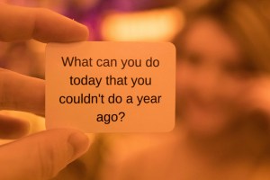 A sign asking 'What can you do today that you couldn't do a year ago?'